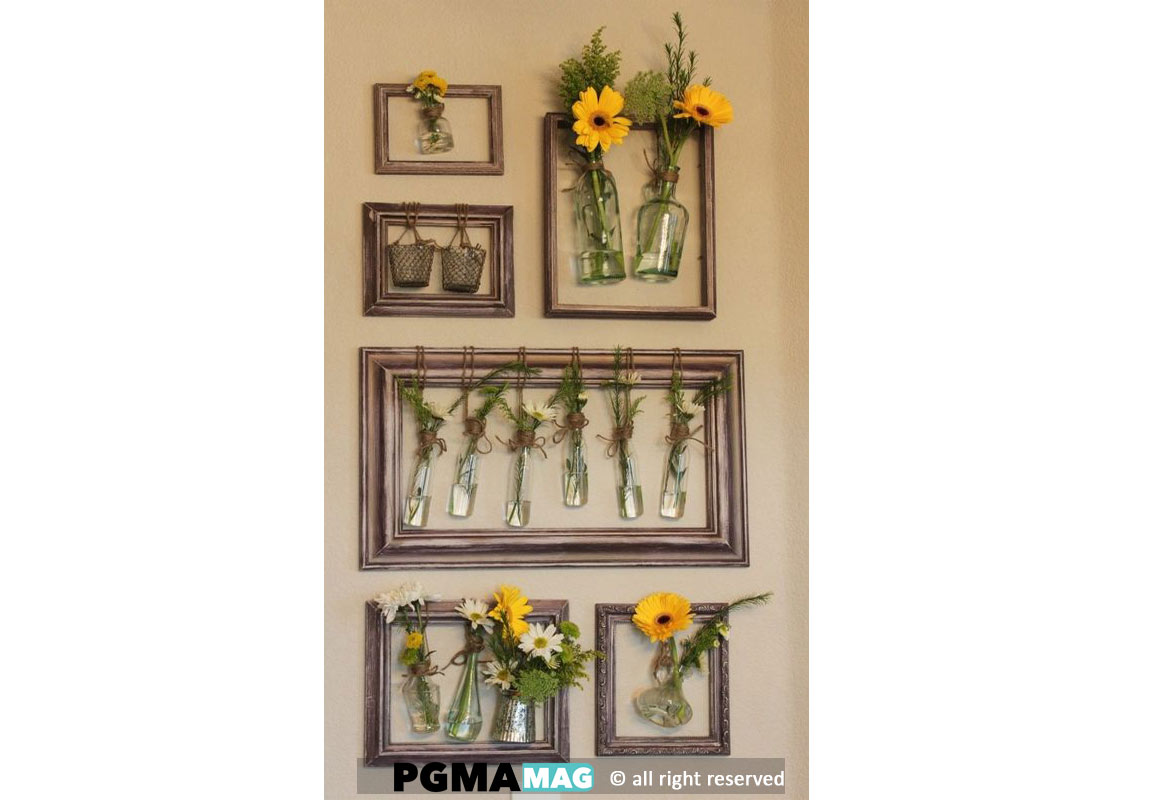 میتوانید گل های خشک خود را قاب گرفته و به صورت عمودی و افقی و یا گروهی  روی دیوار نصب کنید.